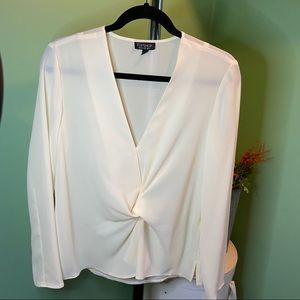 Top Shop creme colored, v neck and knotted front